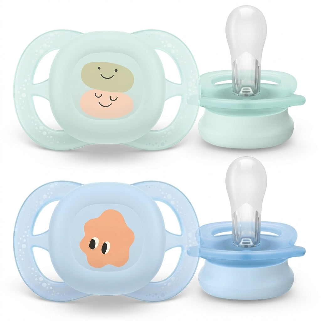 זוג מוצצי סיליקון 0-2 חודשים Avent Ultra Start - צבע פסטל ירוק ותכלת עם איורי חיוכים