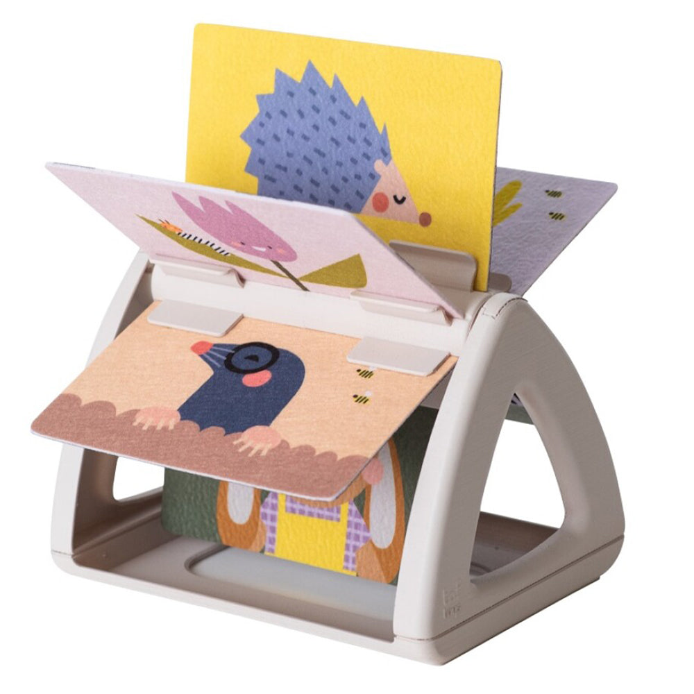 Taf Toys ספר מסתובב ומרשרש לעידוד השהייה על הבטן
